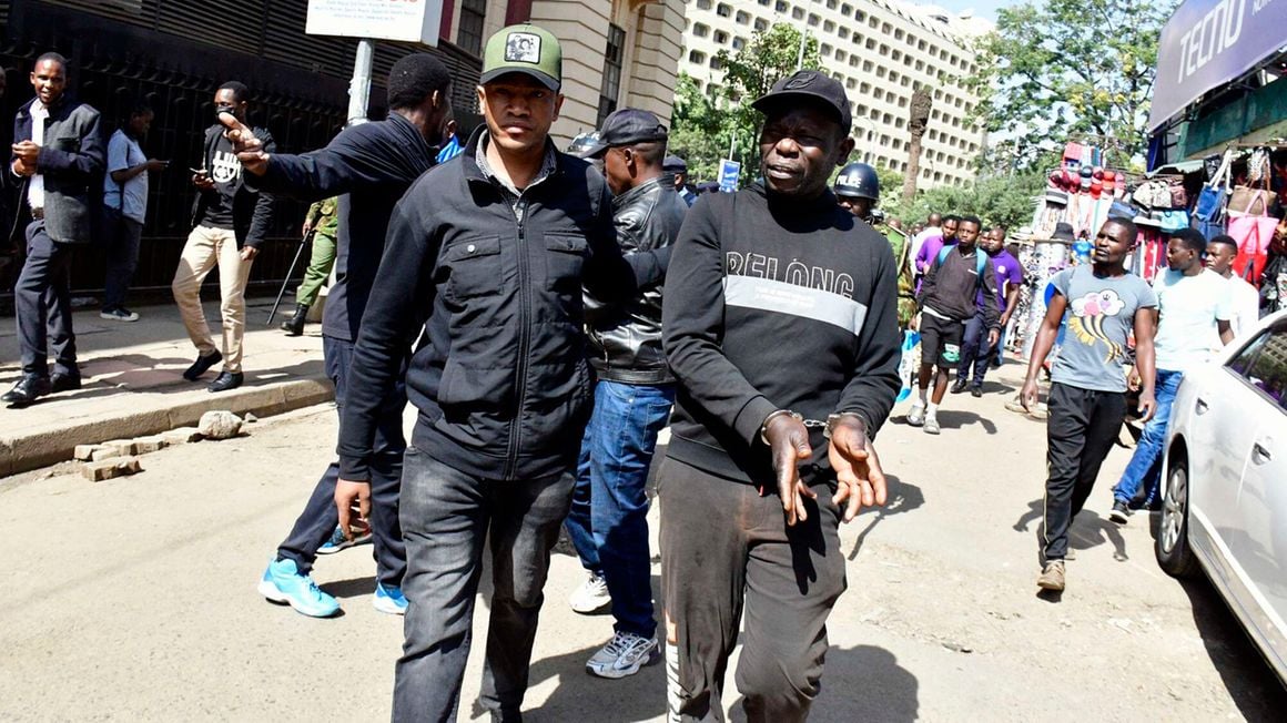 Police officers arrest a protestor at the Kenya National Archives in Nairobi, Kenya on June 18, 2024 for taking part in the Occupy Parliament Protests against the 2024 Finance Bill. PHOTO | FILE | NMG