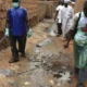 In this Monday, Sept. 6, 2010 photo, healthcare workers spray a chlorine solution designed to kill cholera bacteria, in Ganjuwa in Nigeria's rural Bauchi State - Copyright © africanews Sunday Alamba/AP