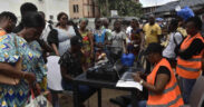 Ivory Coast sets up mobile enrollment for a health coverage program criticized over glitches