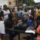 Ivory Coast sets up mobile enrollment for a health coverage program criticized over glitches