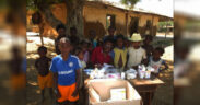 Dr Mamy Andrianirina Rakotondratsara (centre) distributing antimalarials in rural Madagascar.