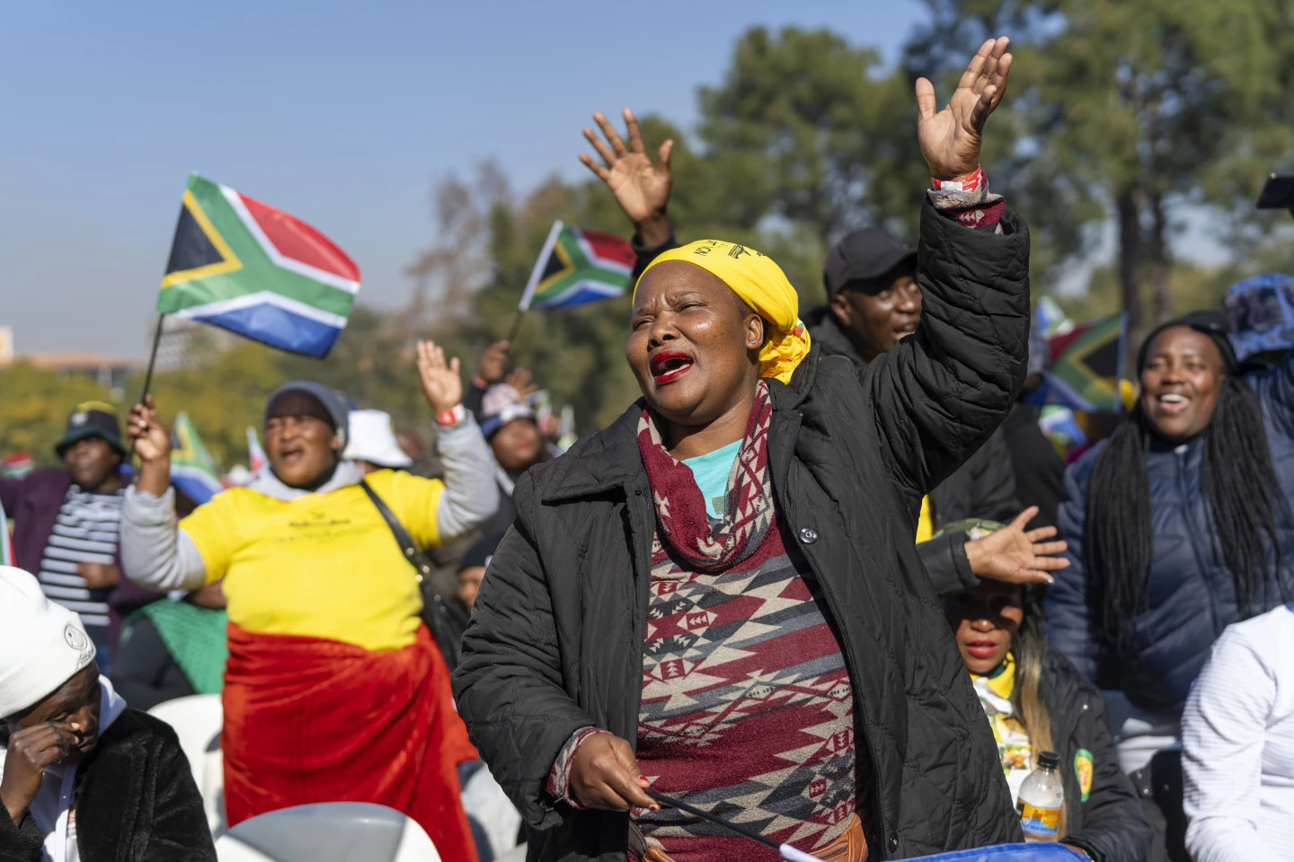 South Africans gather ahead of the inauguration of South Africa’s Cyril Ramaphosa as President at the Union Buildings South Lawns in Tshwane, South Africa, Wednesday, June 19, 2024. (AP Photo/Jerome Delay)