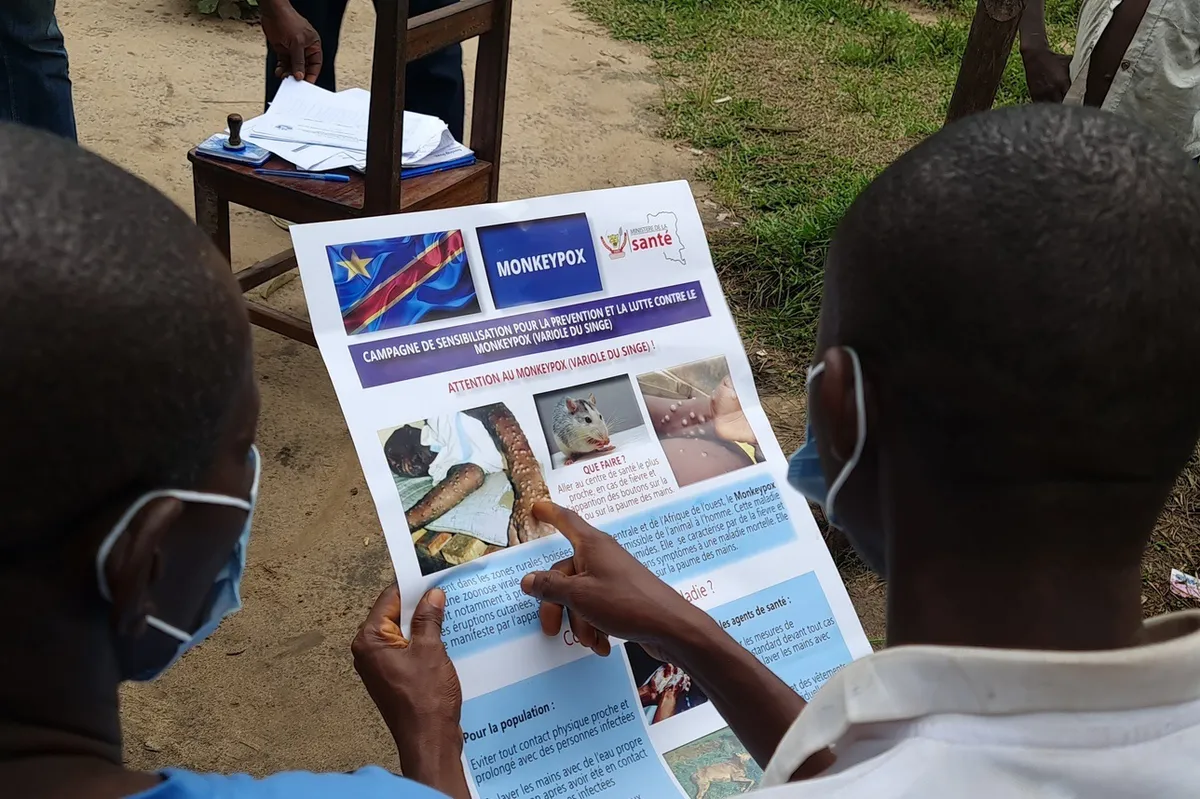 A WHO team provides information about how to avoid mpox to residents in Maniema province, eastern Democratic Republic of Congo, in 2022.Photographer: Eugene Kabambi/World Health Organization